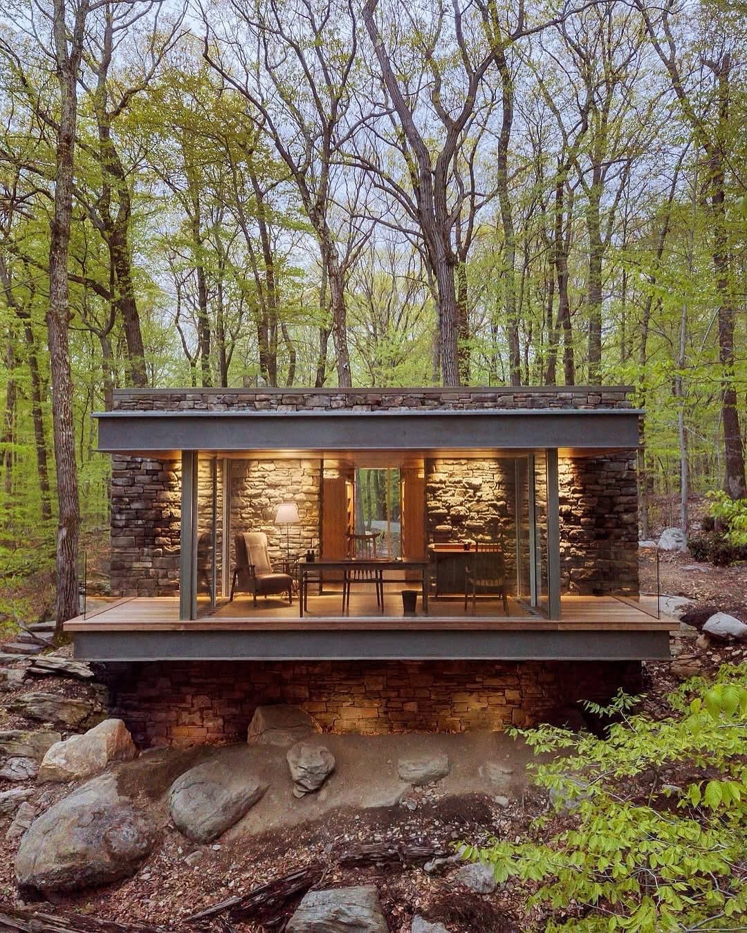 A Glass Haven Suspended in the Forest
